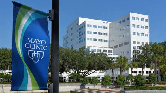 Mayo Clinic campus signage outside a medical building